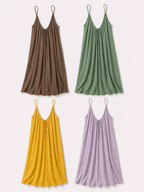 Overhead inventory photograph, 3:4 portrait. Show the exact four-dress offer as four separate, count